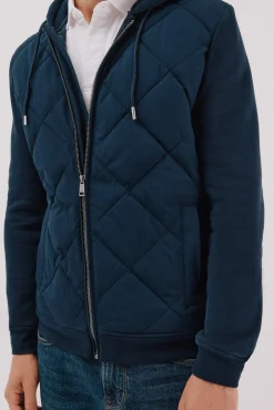 -Regular fit-Sweatshirt fabric combined with technical fabric-Front zip fastening, hood and side pockets-By purchasing our cotton products, you are supporting our investment in the Better Cotton initiative. This product has been obtained th