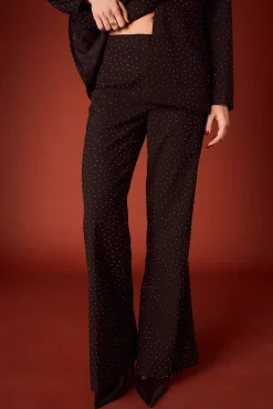 Calça boca de sino com strass