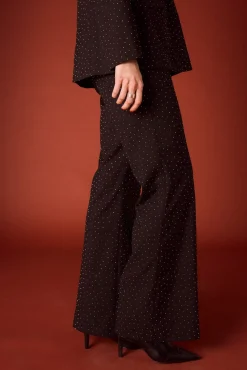 Calça boca de sino com strass