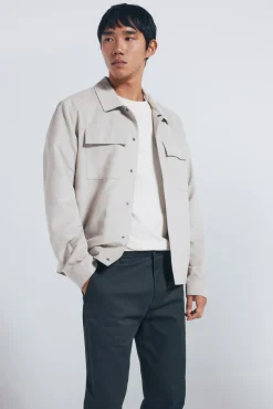 Calça calças chino slim fit com micro estampa