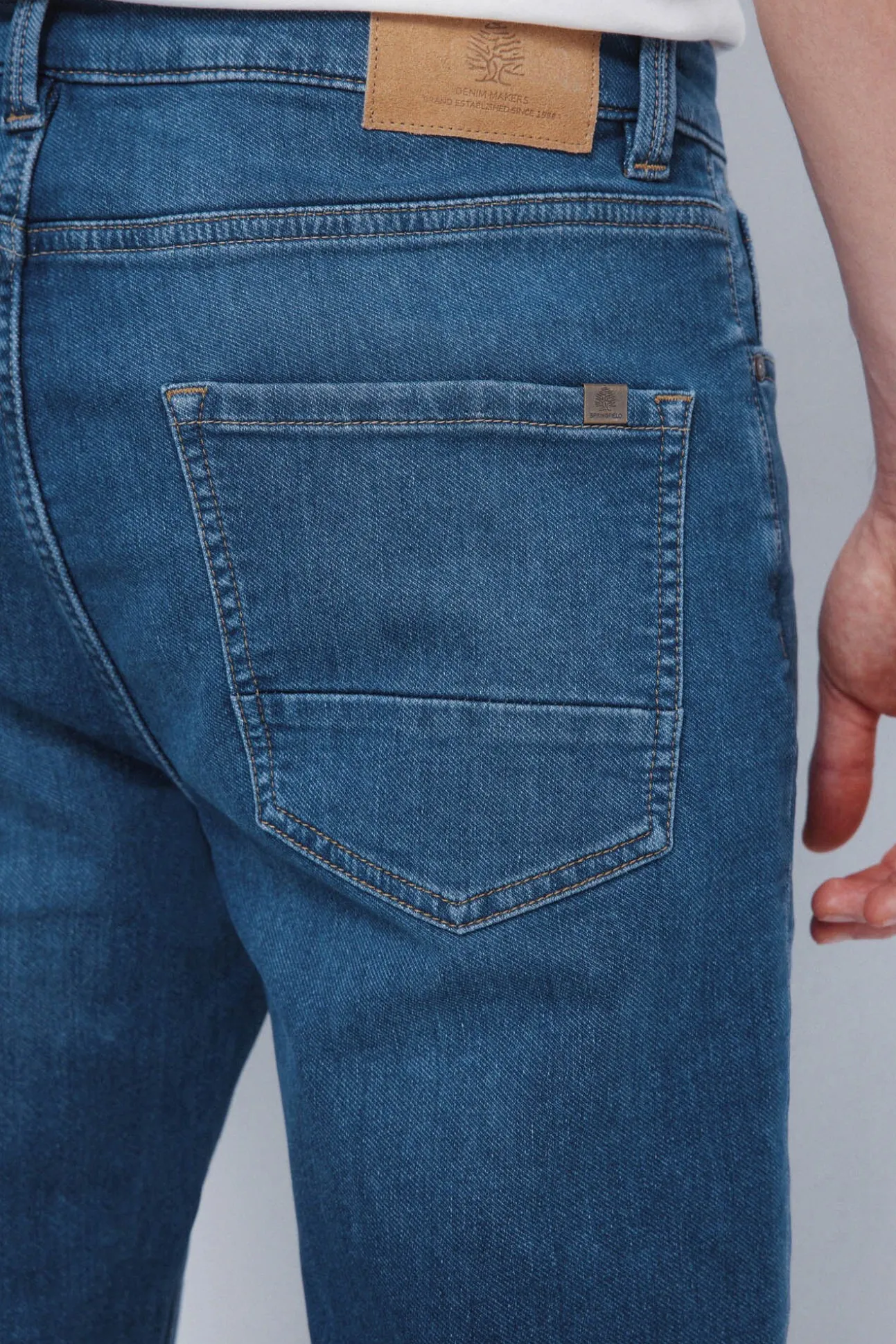 Calça jeans de malha slim fit