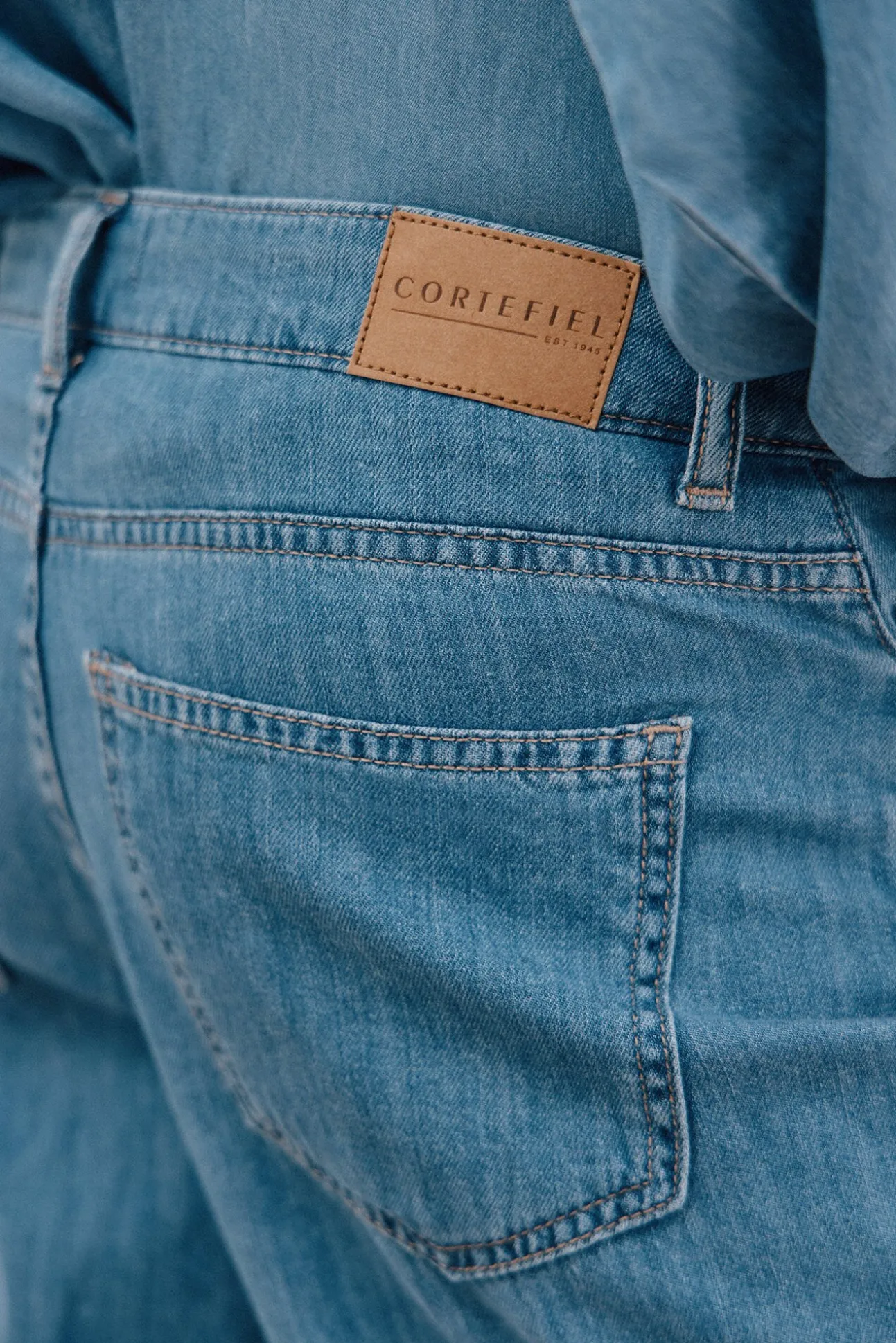 Calça jeans palazzo longa