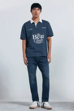 Calça jeans slim fit de malha denim