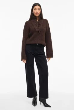 Calça largas com bolsos frontais