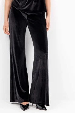 Calça longas de veludo elástico com design elegante