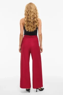 Calça social de pernas largas com cinto de flores