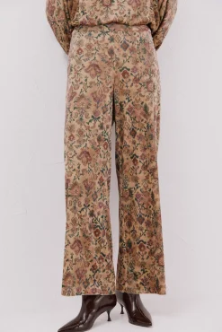 Calças de veludo estampado