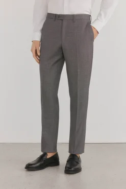 Calças estilo olho de pássaro, com modelagem slim fit e bielástica
