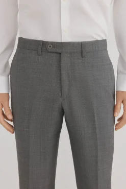 Calças estilo olho de pássaro, com modelagem slim fit e bielástica