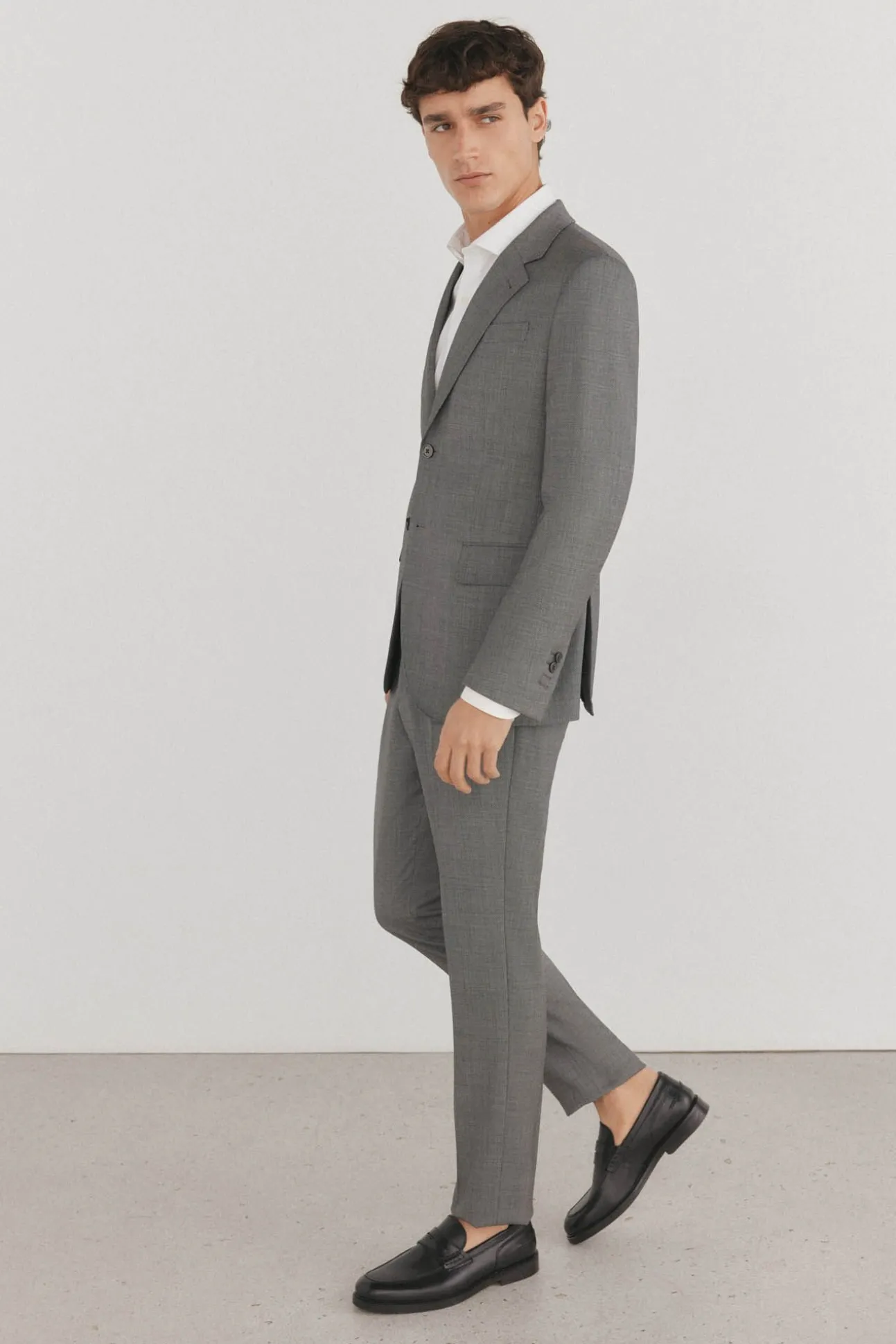 Calças estilo olho de pássaro, com modelagem slim fit e bielástica