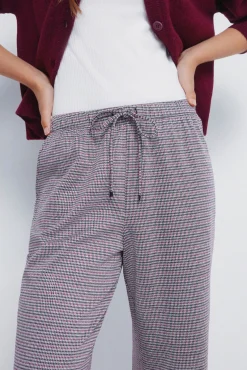 Calças jogger de perna larga
