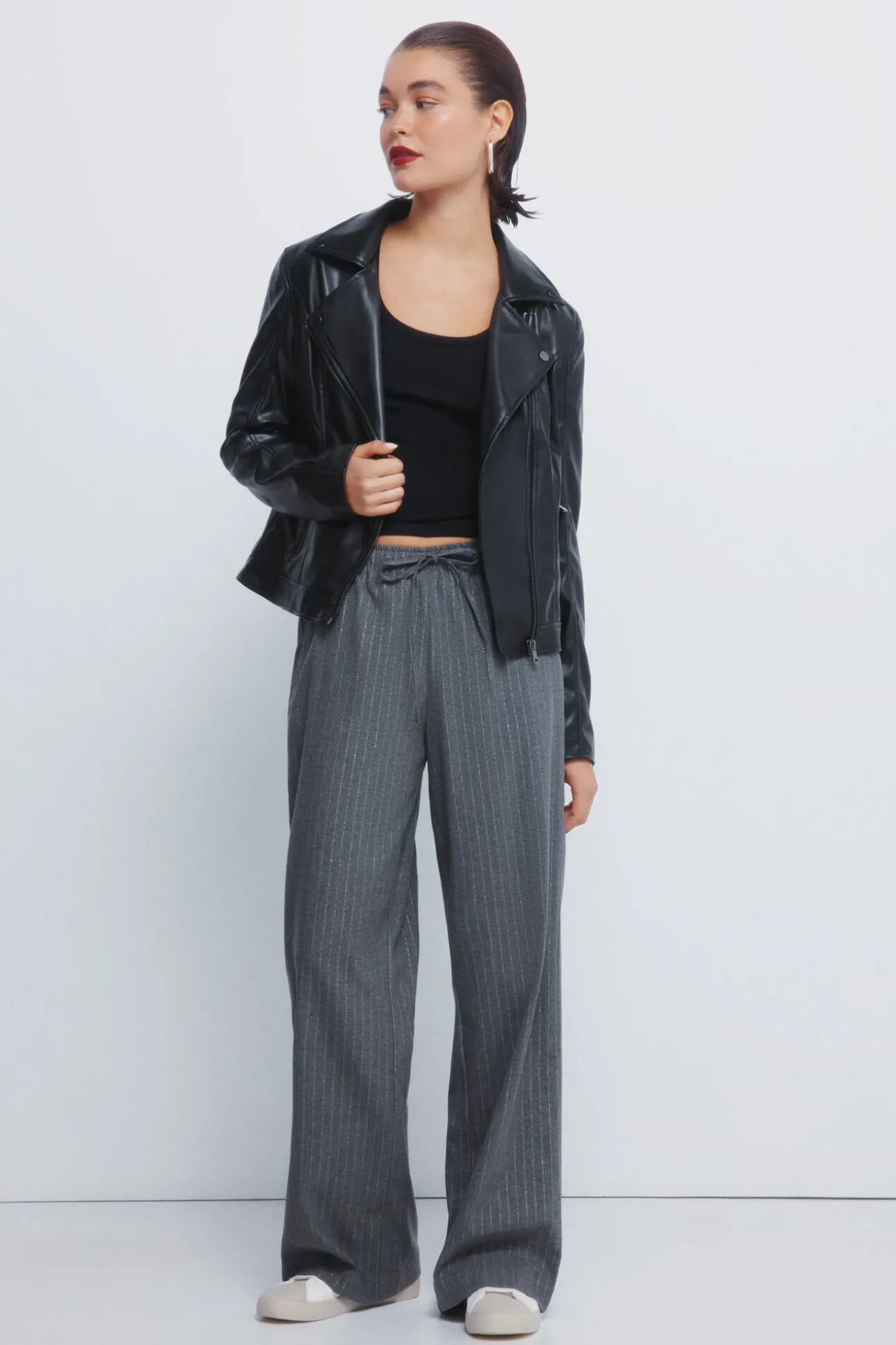 Calças jogger riscas de lurex
