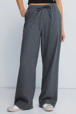 Calças jogger riscas de lurex