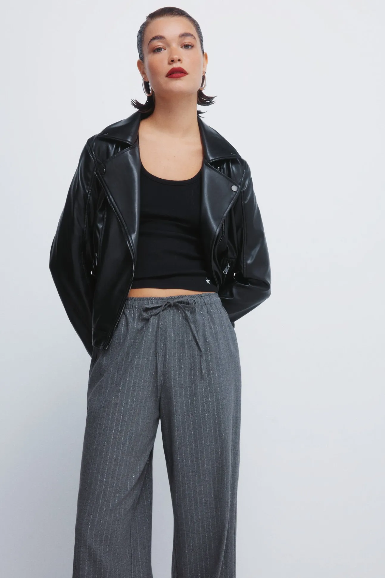 Calças jogger riscas de lurex