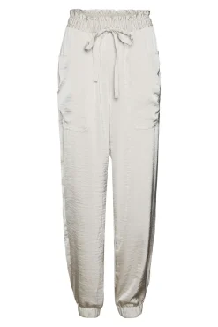 Calças skinny efeito acetinado