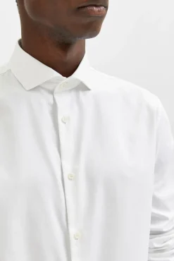 Camisa de manga comprida de vestir 100% algodão.