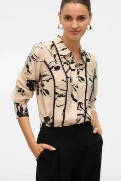 Camisa de manga comprida com linhas bordadas