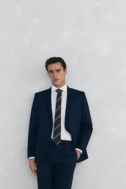 Camisa social lisa que não pode ser passada a ferro + resistente a manchas