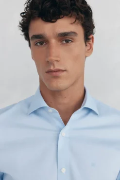Camisa social lisa que não pode ser passada a ferro + resistente a manchas