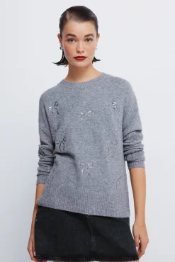 Camisola com laços de lantejoulas