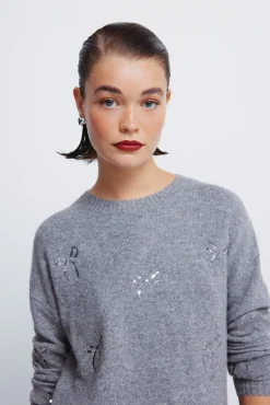 Camisola com laços de lantejoulas