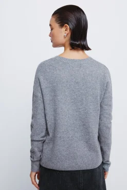 Camisola com laços de lantejoulas