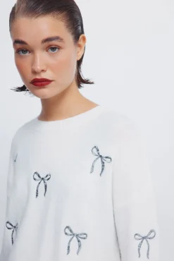 Camisola com laços de lantejoulas