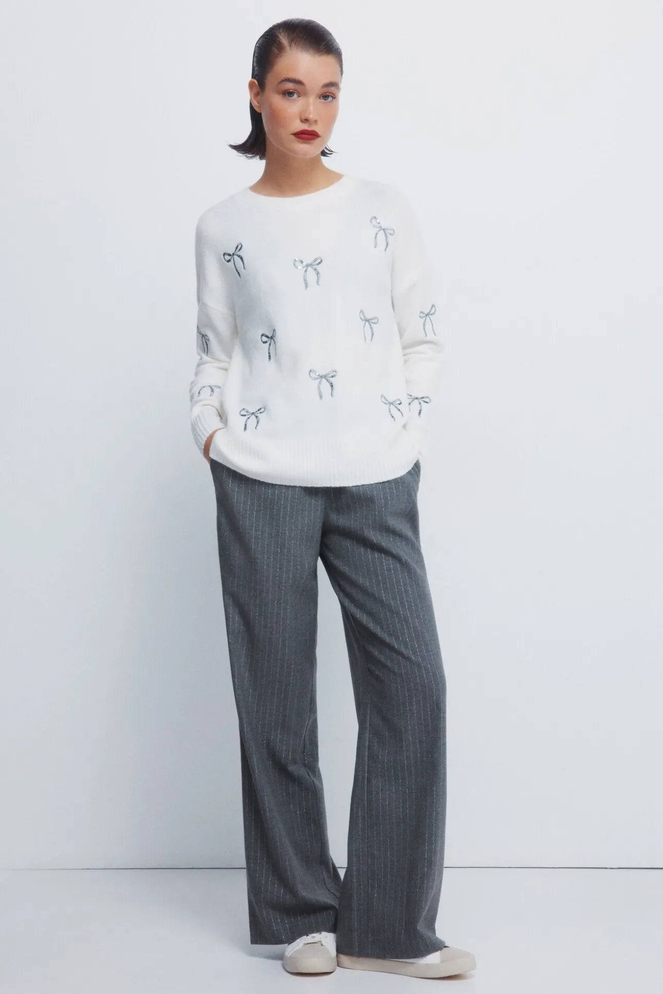 Camisola com laços de lantejoulas