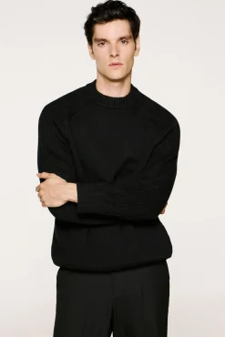 Camisola de gola alta 100% algodão orgânico.