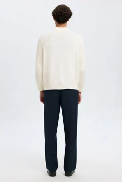Camisola de gola alta 100% algodão orgânico.