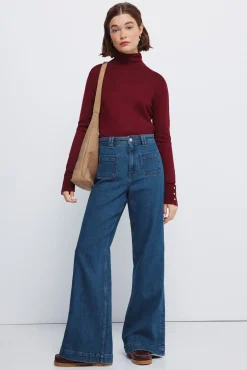 Camisola de gola alta com botões e punhos