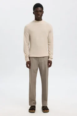 Camisola de gola falsa 100% lã merino.