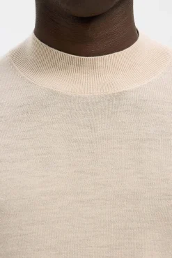 Camisola de gola falsa 100% lã merino.