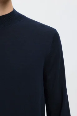 Camisola de gola falsa 100% lã merino.