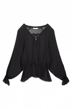 Clemência. Blusa com fecho cruzado