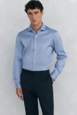 Conjunto de calças e camisa