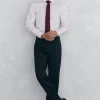 Conjunto de gravata, calças e camisa