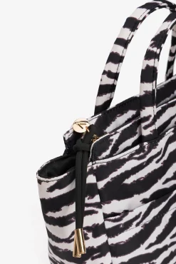Mala acolchoada com estampado de zebra