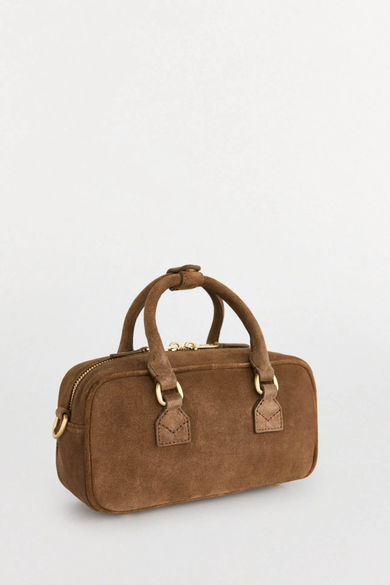 mini bolsa de boliche com mala de tiracolo de pele