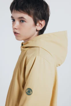 Parka amarelo pastel para criança
