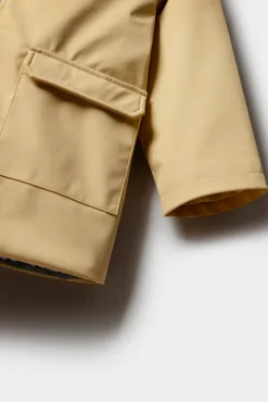 Parka amarelo pastel para criança