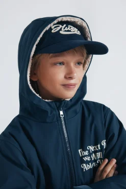 Parka azul marinho com frase para criança