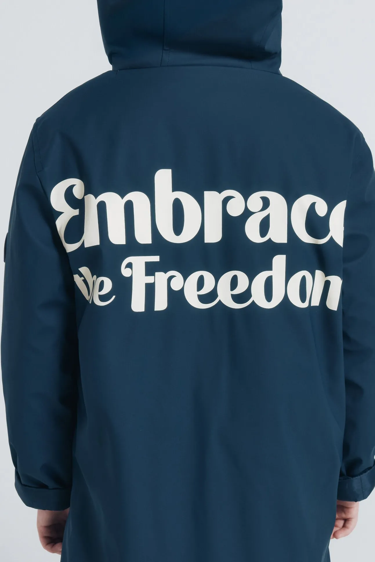 Parka azul marinho com frase para criança