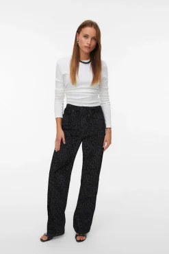 perna jeans larga com estampa animal