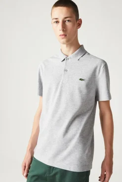 Polo com bordado de crocodilo costurado