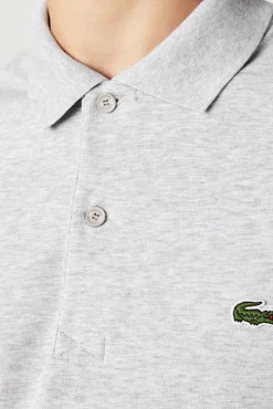 Polo com bordado de crocodilo costurado