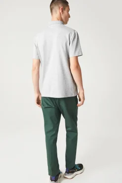 Polo com bordado de crocodilo costurado