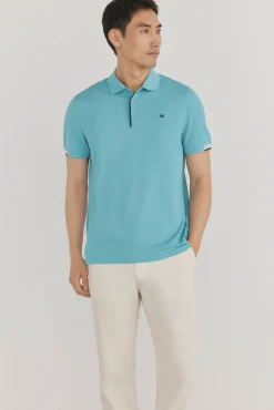 Polo com punhos contrastantes