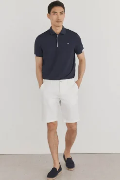 Polo com punhos contrastantes