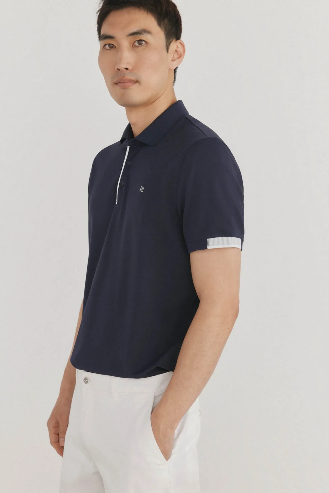 Polo com punhos contrastantes